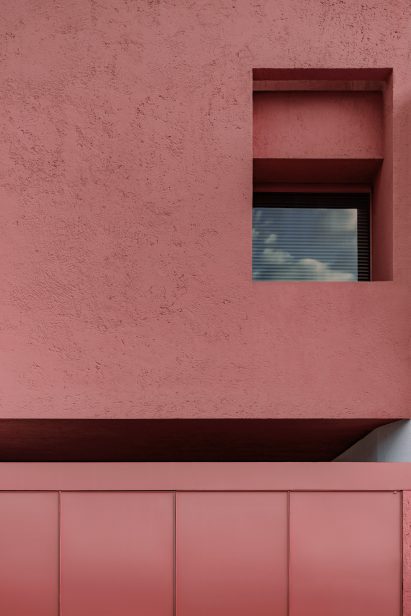 Close-up of front elevation with a single opening in the top right corner