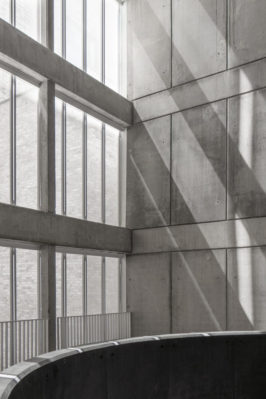 Concrete panelled interior with large glazing