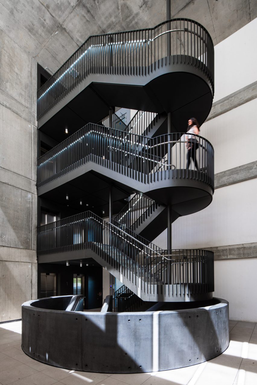 Black metal staircase in a concrete space