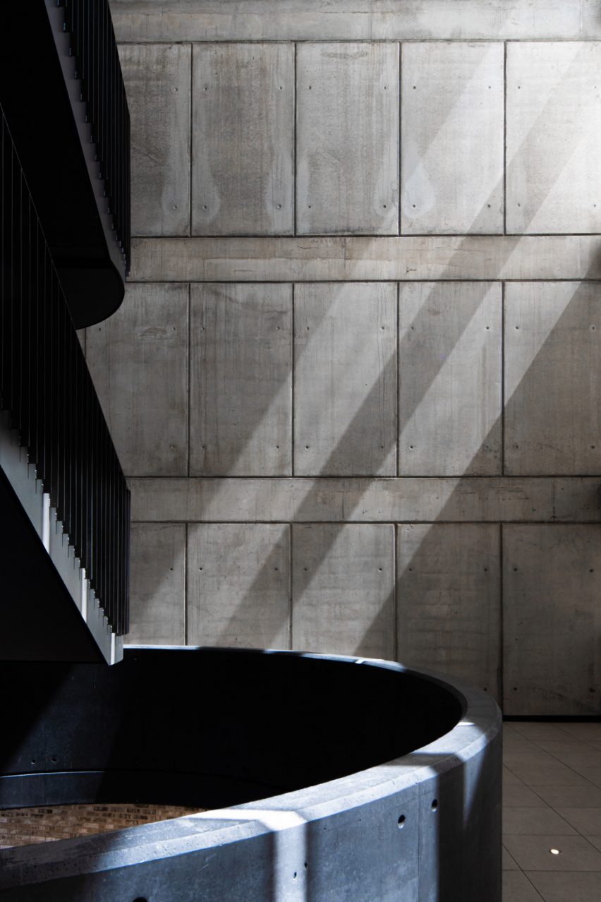Black metal staircase in a concrete space
