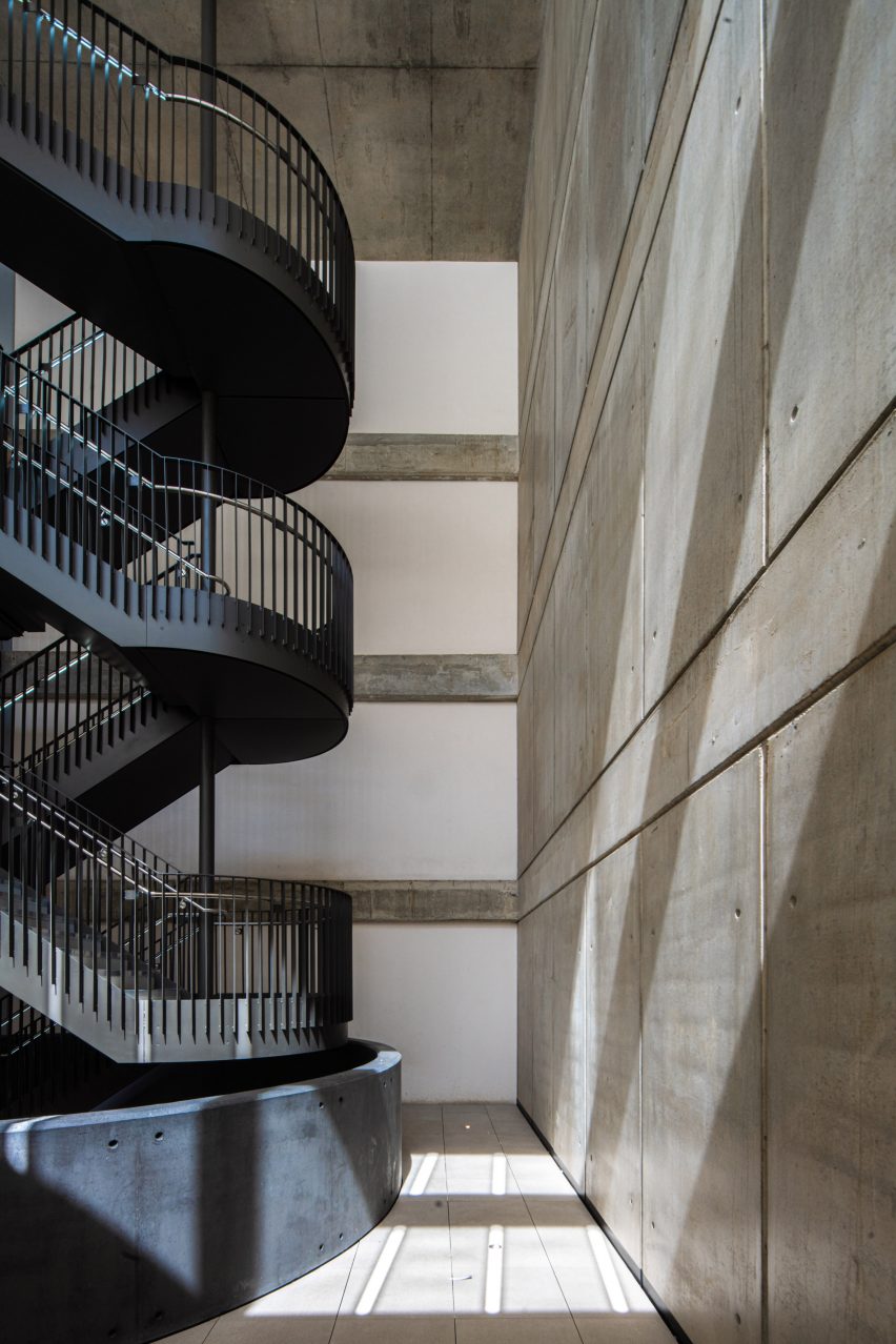Black metal staircase in a concrete space