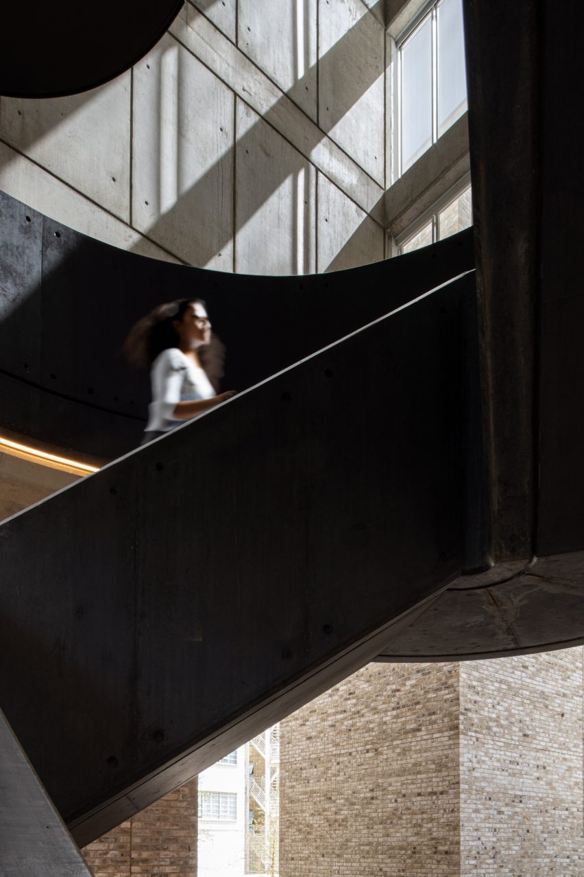 Black metal staircase in a concrete space