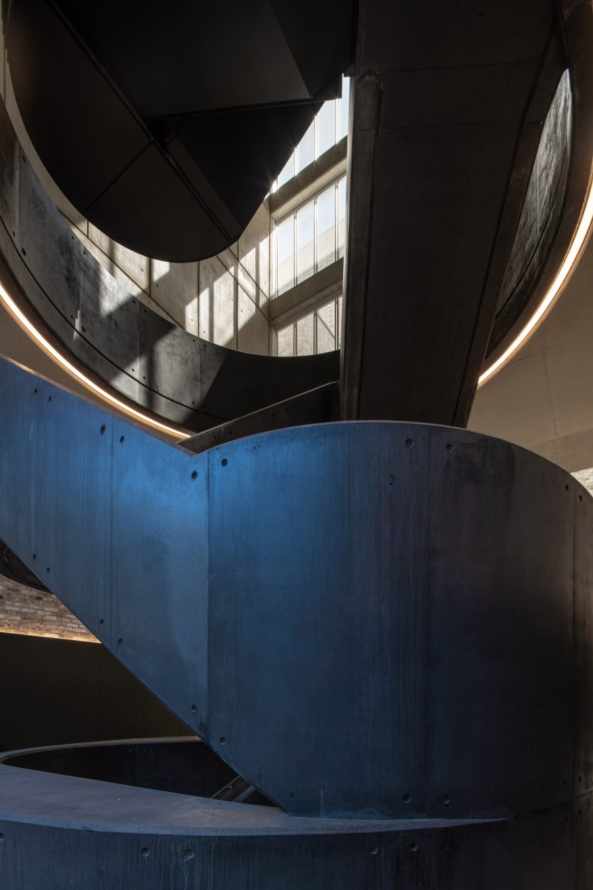 Black metal staircase in a concrete space