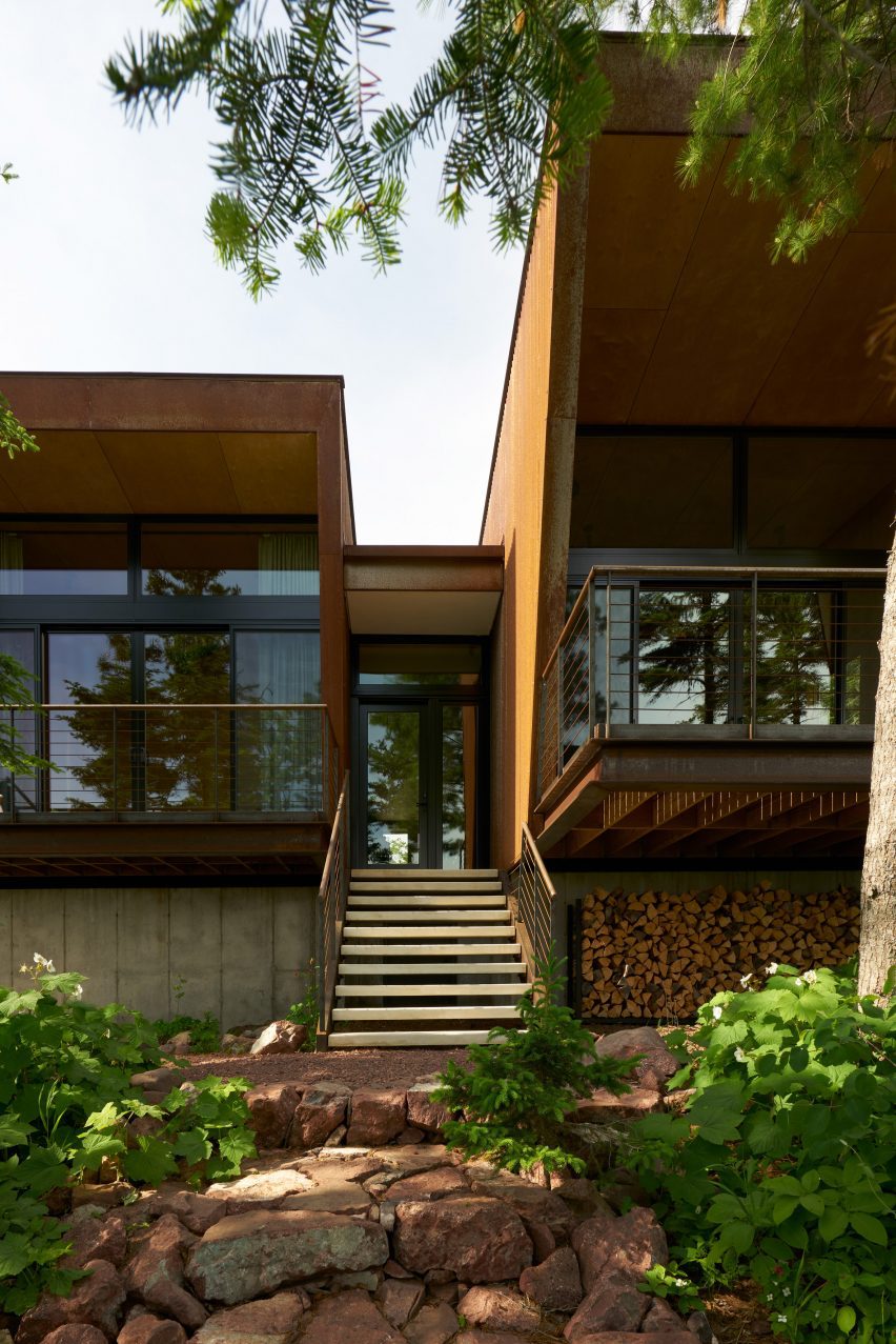 A copper clad cabin overlooking a lake