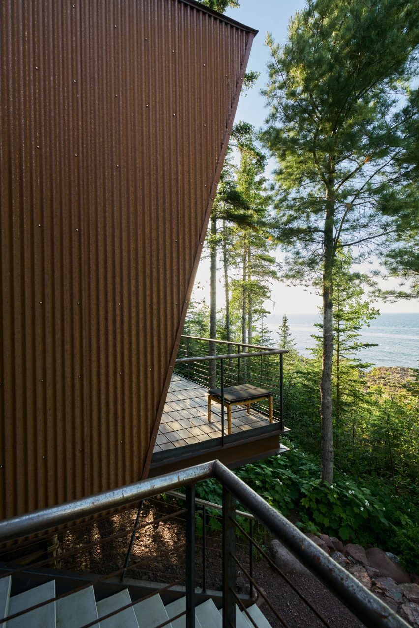 A copper clad cabin overlooking a lake