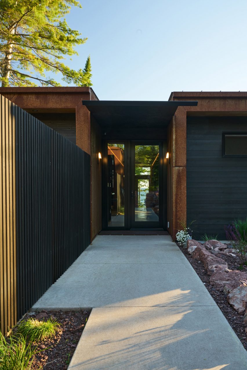 A walkway leading into a house