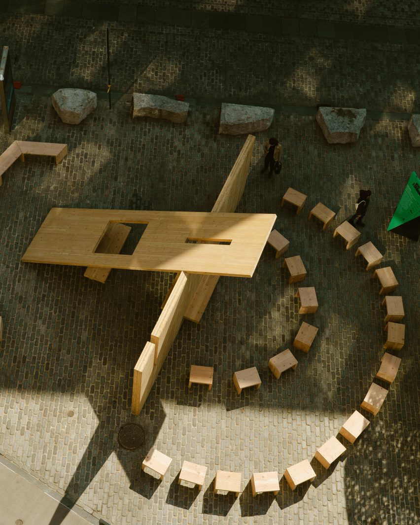 CLT panels create a pavilion in a nyc square with small chairs