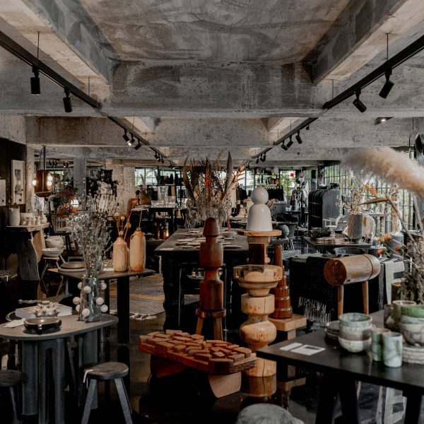 Photo of exhibition with lots of furniture and design objects