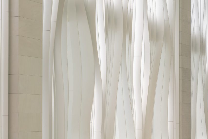 white rippling facade
