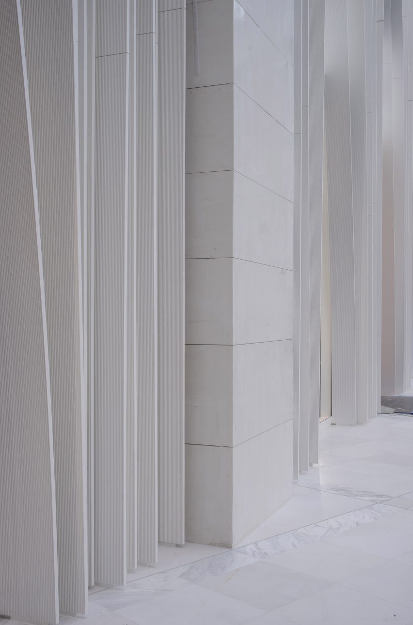 white rippling facade