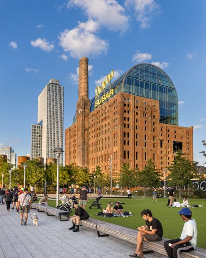 Park with restored Domino Refinery in background