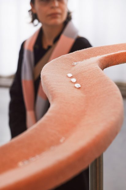 Close-up of water droplets on a woollen chute
