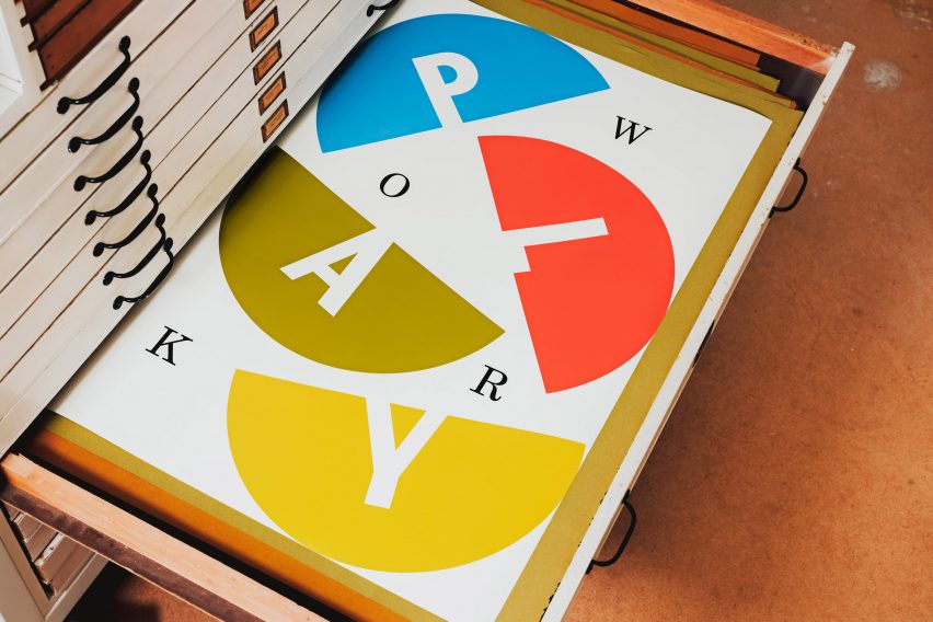A white poster with colorful graphics