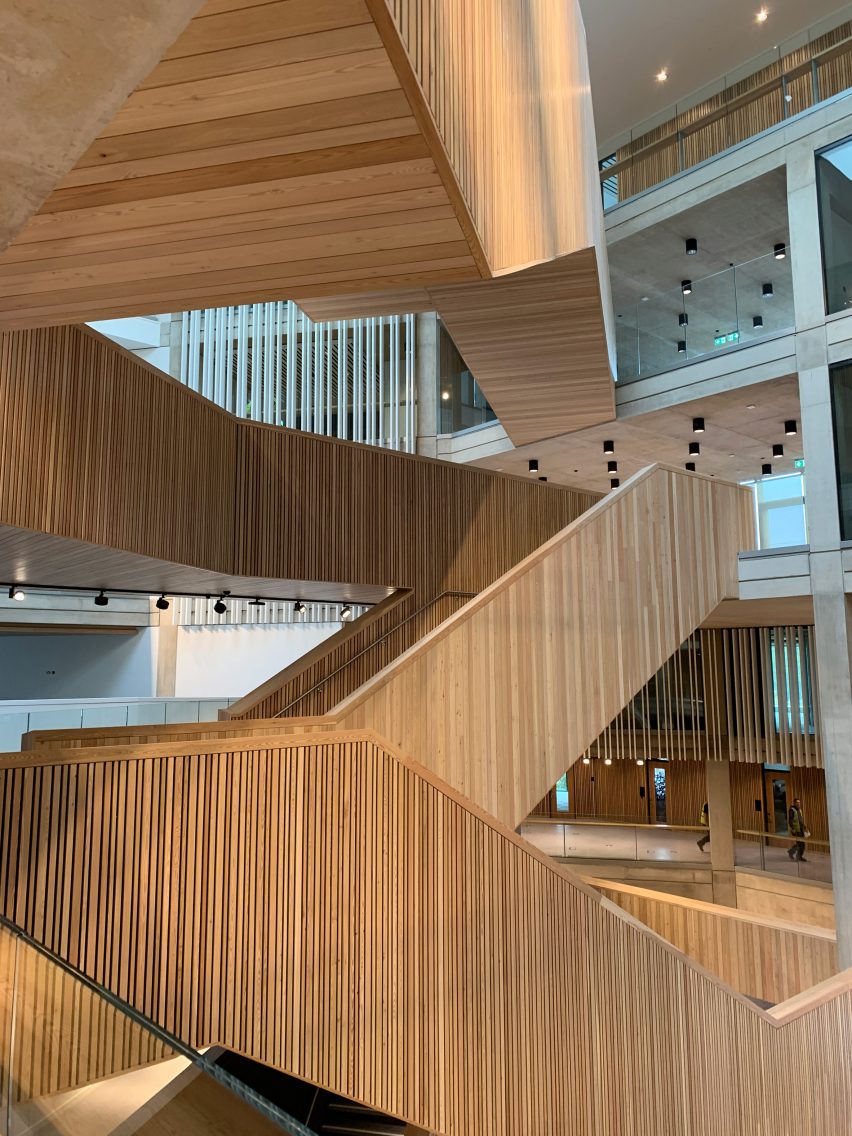 Criss-crossing timber staircases in an atrium