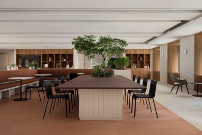 Seating area inside Mitsui & Co Real Estate office in Tokyo by Flooat