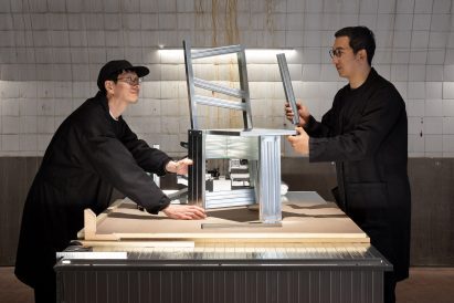 Daisuke Yamamoto and Takeo Masui assembling a chair