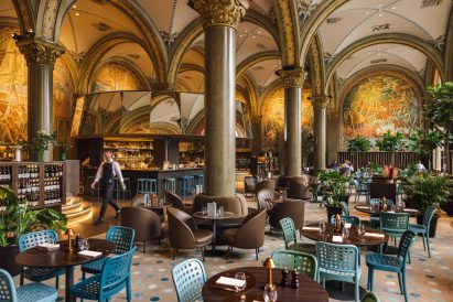 Restaurant lined with green columns