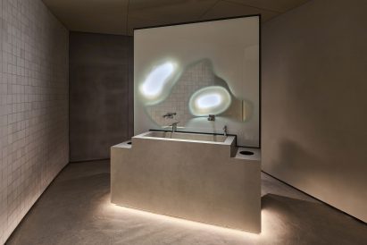 Bathroom with a central standalone sink unit