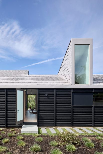 Monitor windows on black-clad home