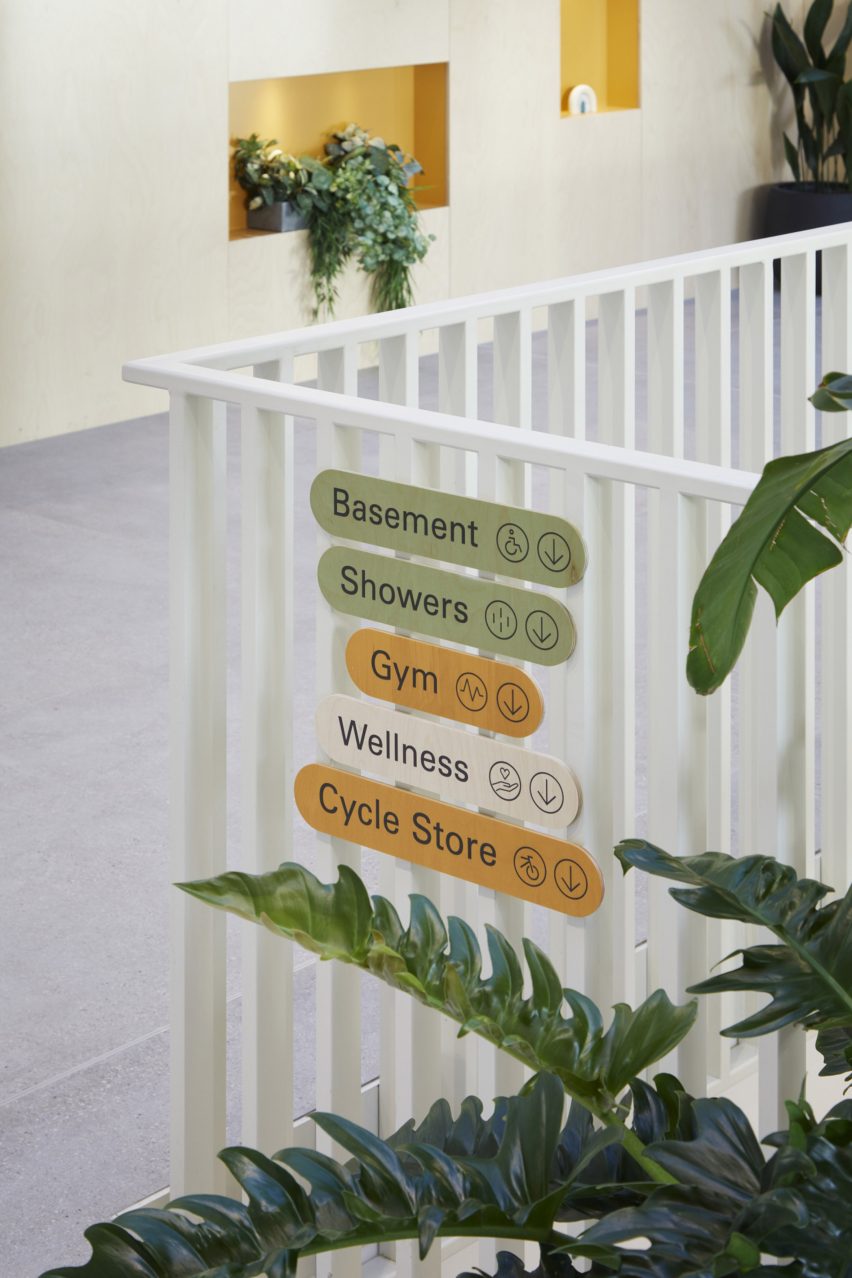 Wayfinding signs at the Here+Now office building by Hawkins\Brown