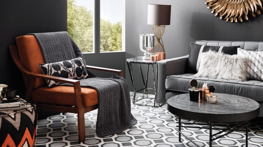 a living room with cement tiles floor