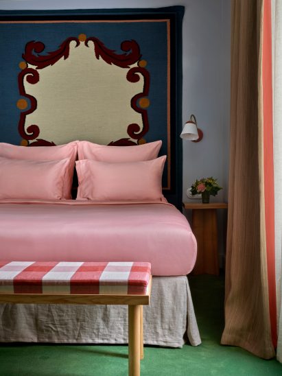 Bedroom with patterned headboard