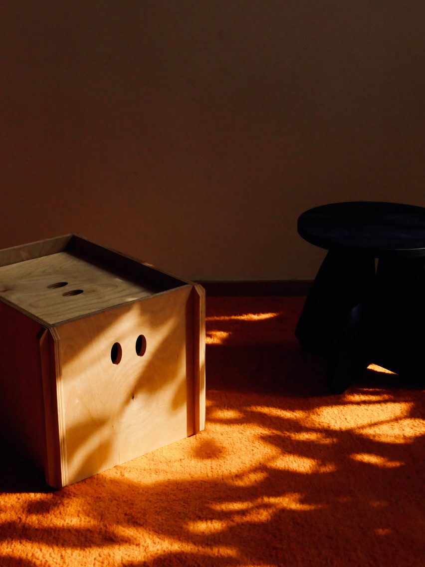 A stool with small eyes cut into it