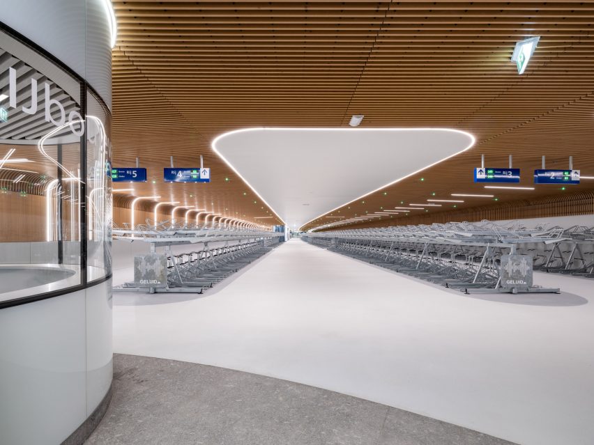 Interior view of IJboulevard bike parking facility by VenhoevenCS Architecture + Urbanism