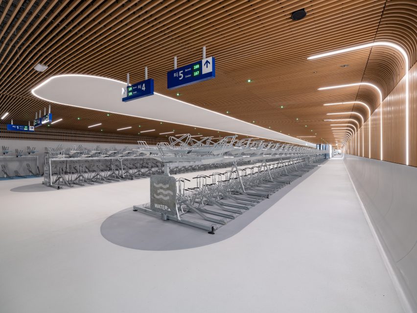 Interior view of IJboulevard bike parking facility by VenhoevenCS Architecture + Urbanism