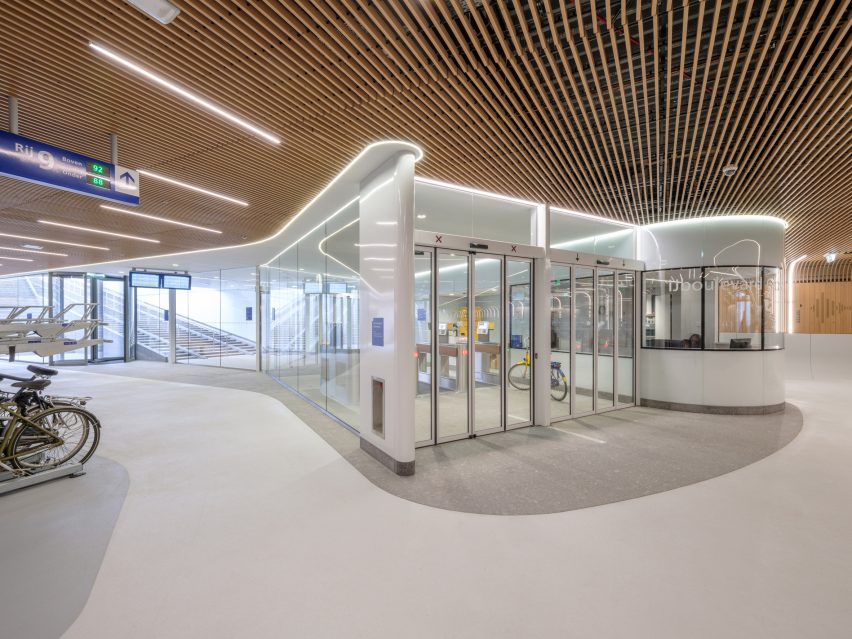 Interior view of IJboulevard bike parking facility by VenhoevenCS Architecture + Urbanism