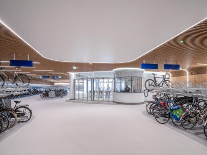 Interior view of IJboulevard bike parking facility by VenhoevenCS Architecture + Urbanism