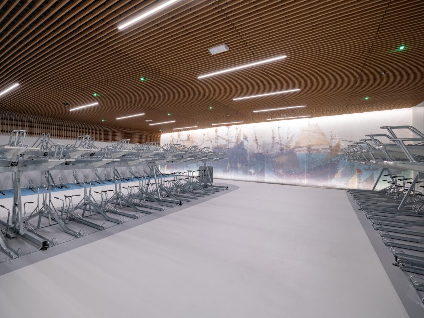 Interior view of IJboulevard bike parking facility by VenhoevenCS Architecture + Urbanism