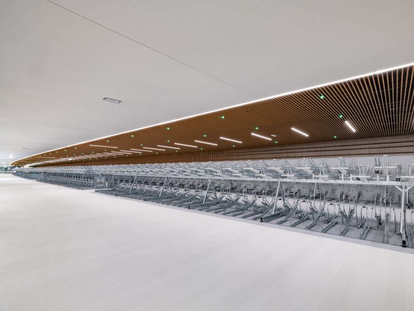 Interior view of IJboulevard bike parking facility by VenhoevenCS Architecture + Urbanism