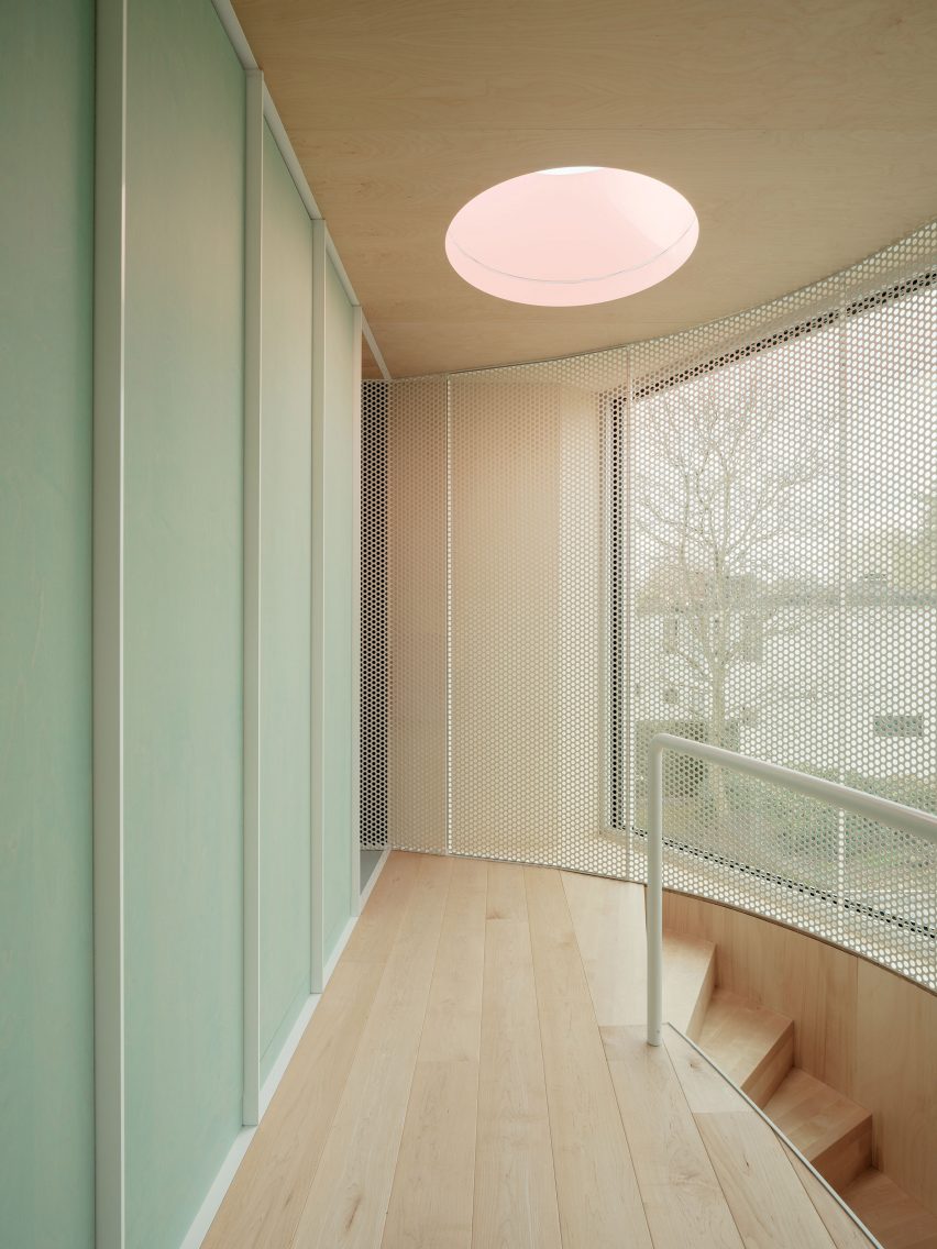 Wood-lined interior at the BEEV home by ISM Architecten