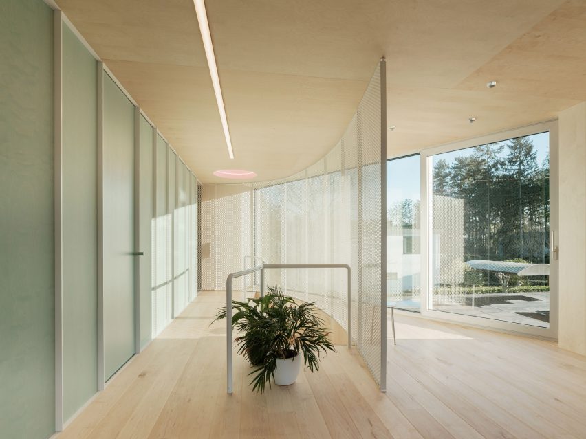 Wood-lined interior at the BEEV home by ISM Architecten