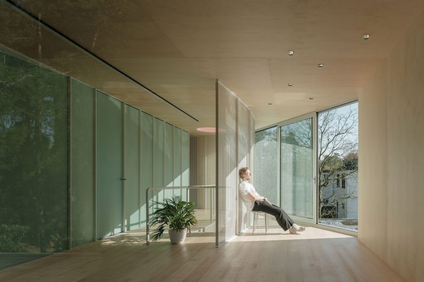 Wood-lined interior of the BEEV home by ISM Architecten
