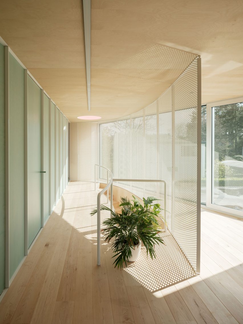 Wood-lined interior at the BEEV home by ISM Architecten