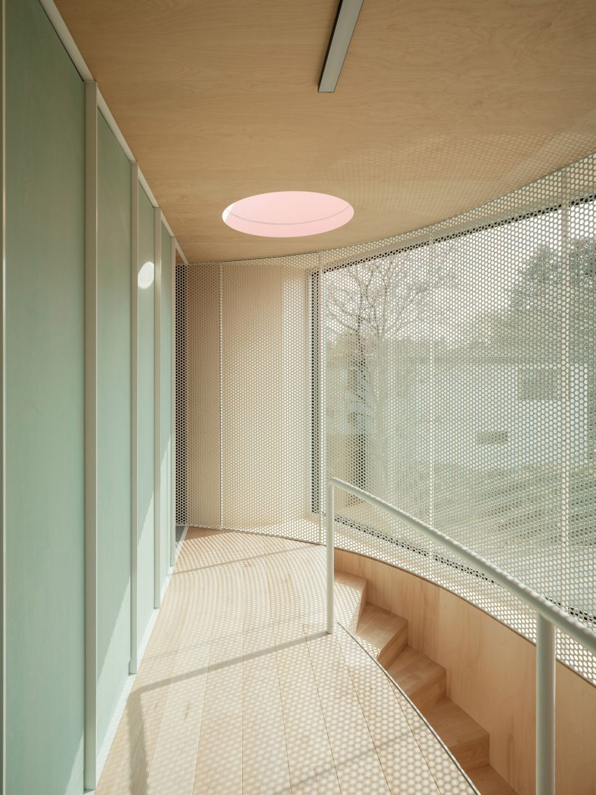 Wood-lined interior at the BEEV home by ISM Architecten