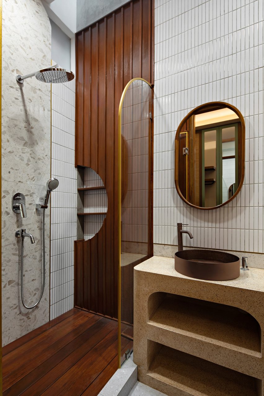 White tile and wood bathroom interior