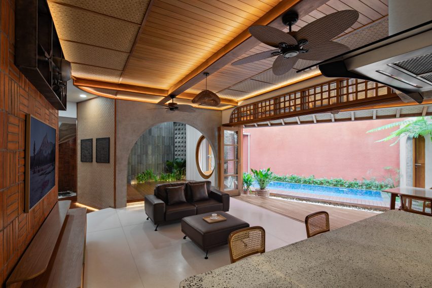 Living and dining room leading to an outdoor terrace
