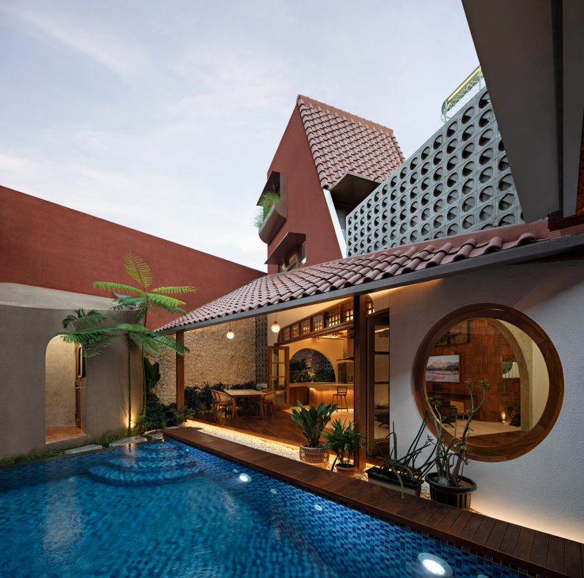 Courtyard swimming pool at Distracted House in Jakarta by Ismail Solehudin Architecture