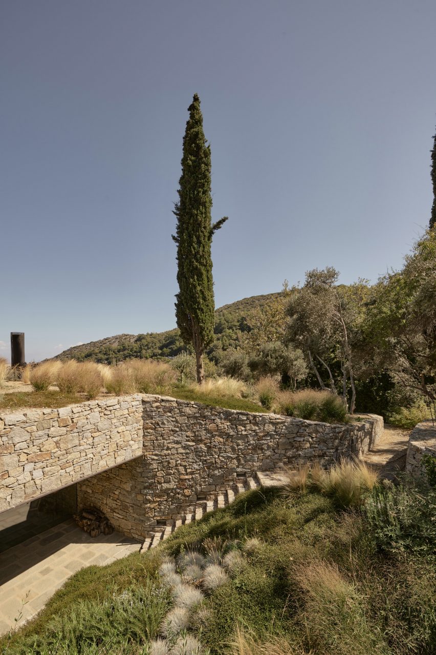 Stone steps leading to the Liknon building by K-studio
