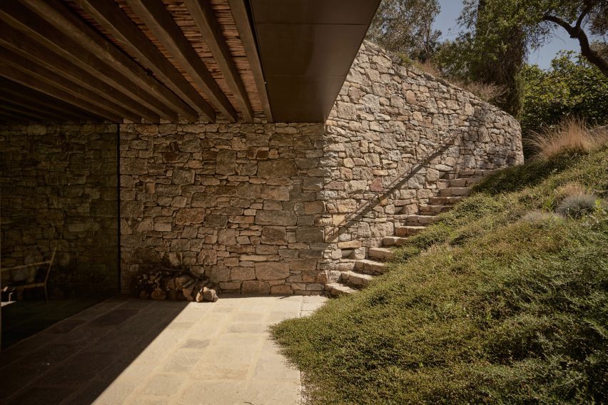 Stone steps leading to the Liknon building by K-studio