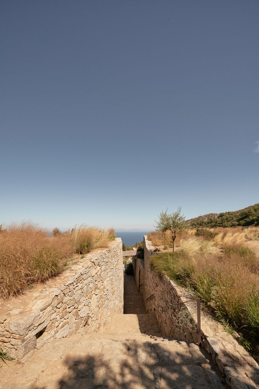 Stone staircase descending into a hillside