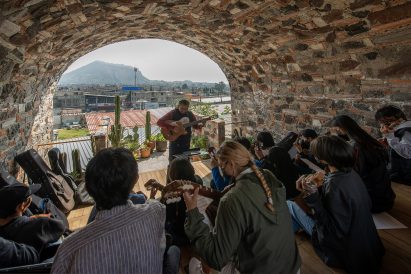 Guitar man playing for audience