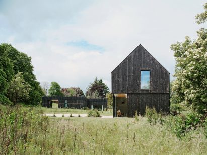 Loader Monteith charred timber office and residence
