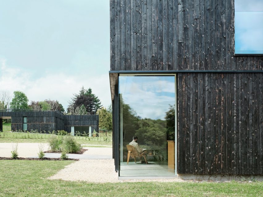 Loader Monteith charred timber office and residence