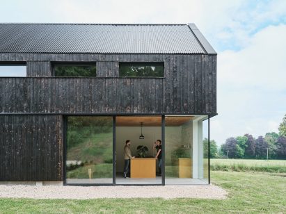 Loader Monteith charred timber office and residence