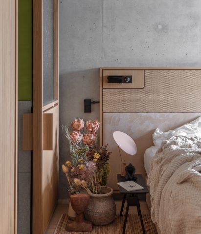 Jacques Biny bedside wall lights were incorporated into custom headboards