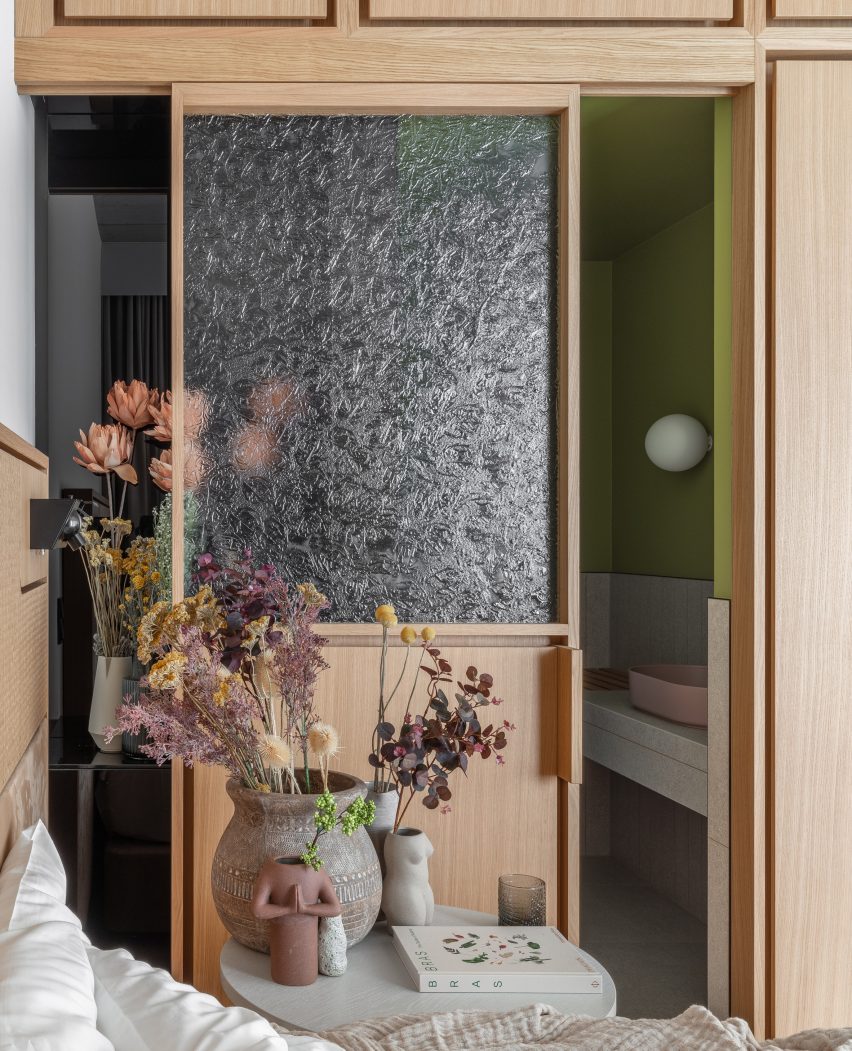 Glass panels are used for sliding bathroom doors